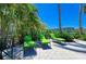 Relax and unwind in these lounge chairs near the pool, nestled among lush tropical palm trees at 275 Sapphire Lake Dr # 101, Bradenton, FL 34209