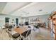 Inviting community center with tables, chairs, piano, and a well-stocked library for residents' enjoyment at 2839 Swifton Dr # 28, Sarasota, FL 34231