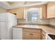 Kitchen with matching appliances and plenty of cabinet space at 2839 Swifton Dr # 28, Sarasota, FL 34231