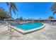 Sparkling community pool surrounded by lush landscaping and comfortable lounge chairs, perfect for relaxation at 2839 Swifton Dr # 28, Sarasota, FL 34231
