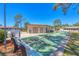 Community shuffleboard court with seating; perfect for outdoor recreation and relaxation with friends and neighbors at 2839 Swifton Dr # 28, Sarasota, FL 34231