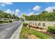 Sign for Villas is landscaped and set in front of a No Outlet street on a sunny day at 2839 Swifton Dr # 28, Sarasota, FL 34231