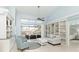 The living room has natural light, built in bookshelves, and tile flooring at 3069 Stone St, Port Charlotte, FL 33981