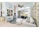 Light-filled living room with patio access and built in bookshelves for storage at 3069 Stone St, Port Charlotte, FL 33981
