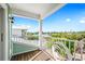 Charming balcony with white railings and city views, perfect for outdoor relaxation and enjoyment at 336 Avenida De Mayo, Sarasota, FL 34242