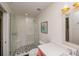 Modern bathroom features a stylish vanity, frameless shower, and contemporary fixtures at 336 Avenida De Mayo, Sarasota, FL 34242