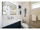Well-appointed bathroom with modern vanity, stylish fixtures, and decorative accents at 336 Avenida De Mayo, Sarasota, FL 34242