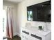 Bedroom with a dresser, decorations, and window with curtains at 336 Avenida De Mayo, Sarasota, FL 34242