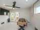 Spacious bonus room offers a ceiling fan, and includes walk-out access and foosball table at 336 Avenida De Mayo, Sarasota, FL 34242