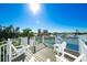 Rooftop deck with chairs and view of the community and water at 336 Avenida De Mayo, Sarasota, FL 34242