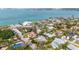 Aerial view of the home in a neighborhood with proximity to the ocean and local amenities at 3455 Flamingo Ave, Sarasota, FL 34242
