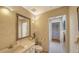 Bathroom featuring a vanity with a large mirror, modern fixtures, and tiled floors at 3455 Flamingo Ave, Sarasota, FL 34242