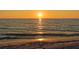 Scenic sunset over the ocean with shimmering golden light reflecting on the water at 3455 Flamingo Ave, Sarasota, FL 34242