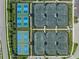 Aerial view of tennis and pickleball courts within an exclusive residential community at 3568 Santa Caterina Blvd, Bradenton, FL 34211