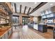Cozy cafe with shelving, brick accents, and a view of the outdoor seating area at 3568 Santa Caterina Blvd, Bradenton, FL 34211