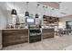 Modern cafe area with sleek counters, stylish pendant lights, and a casual dining space at 3568 Santa Caterina Blvd, Bradenton, FL 34211