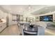 Open kitchen and dining area with large center island at 3568 Santa Caterina Blvd, Bradenton, FL 34211