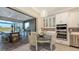 Gourmet kitchen with access to the outdoor grilling area at 3568 Santa Caterina Blvd, Bradenton, FL 34211