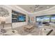 Comfortable living room features a custom entertainment center at 3568 Santa Caterina Blvd, Bradenton, FL 34211