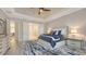 This main bedroom features recessed lighting, ceiling fan, and a door to main bathroom at 3568 Santa Caterina Blvd, Bradenton, FL 34211