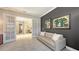 Inviting home office with stylish decor, open doors, and comfortable seating area at 3568 Santa Caterina Blvd, Bradenton, FL 34211