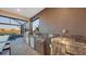 Outdoor kitchen featuring stainless steel appliances, a built-in grill, and scenic views of the golf course at 3568 Santa Caterina Blvd, Bradenton, FL 34211