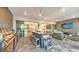 Well-appointed outdoor kitchen with bar seating, a built-in grill, and easy access to the indoor living areas at 3568 Santa Caterina Blvd, Bradenton, FL 34211