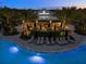 Aerial view of 'Bahama Bar' with patio seating and resort-style pool and lounge seating at 3568 Santa Caterina Blvd, Bradenton, FL 34211