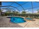 Screened-in pool with attached hot tub and brick pool deck at 3814 Scrub Creek Run, Lakewood Ranch, FL 34211