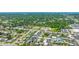 An aerial view of the real estate and surrounding area and roads near a power station at 4001 Beneva Rd # 343, Sarasota, FL 34233