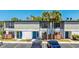 Charming townhouse with a blue front door and beautiful landscaping and private fenced in patios at 4001 Beneva Rd # 343, Sarasota, FL 34233