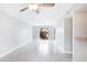 Spacious and bright living room, with tile flooring, flowing to the outside patio through glass doors at 4001 Beneva Rd # 343, Sarasota, FL 34233