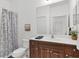Well-maintained bathroom featuring modern fixtures, a vanity with storage, and a shower-tub combination for convenience at 4107 Pine Meadow Dr, Parrish, FL 34219