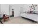 Bedroom featuring neutral tones, plush carpeting, and an ensuite bathroom, offering a private and comfortable retreat at 4107 Pine Meadow Dr, Parrish, FL 34219