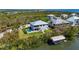 Stunning home with pool, luscious landscaping, and direct access to water, perfect for boating enthusiasts at 4109 Cobia Ct, Palmetto, FL 34221