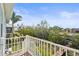 Scenic balcony view overlooking lush greenery and the waterfront, offering a serene outdoor experience at 4109 Cobia Ct, Palmetto, FL 34221