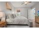Comfortable bedroom offers an inviting design with a king-sized bed, ensuite bathroom and ample storage at 4109 Cobia Ct, Palmetto, FL 34221