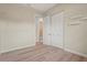 Charming bedroom with light wood floors and closet at 4109 Cobia Ct, Palmetto, FL 34221