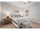 Comfortable bedroom with a king size bed, neutral decor, and a large window providing natural light at 4109 Cobia Ct, Palmetto, FL 34221
