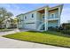 Charming two-story home with a two-car garage, brick driveway, and a private entrance staircase at 4109 Cobia Ct, Palmetto, FL 34221