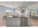Kitchen island featuring granite countertops and stainless steel appliances at 4109 Cobia Ct, Palmetto, FL 34221