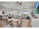 Spacious living area with plush seating, modern decor, and an open floor plan for easy entertaining at 4109 Cobia Ct, Palmetto, FL 34221