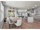 Bright living space features an open concept kitchen, dining and living space, and a sliding door to the lanai at 4109 Cobia Ct, Palmetto, FL 34221