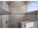 Tiled shower featuring a glass partition and window with natural light at 4109 Cobia Ct, Palmetto, FL 34221