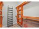 Spacious walk-in closet with built-in shelving and organized storage for easy access at 4109 Cobia Ct, Palmetto, FL 34221