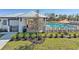 Community pool with lounge chairs, a covered cabana, and lush landscaping providing a resort-like atmosphere at 4206 112Th E St, Palmetto, FL 34221