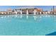 A stunning pool image highlighting the crystal-clear water and nearby lounge, ideal for relaxation and fun at 4206 112Th E St, Palmetto, FL 34221