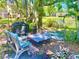 Backyard with grill and seating area at 425 30Th W Ave # C112, Bradenton, FL 34205