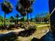 Well-maintained lawn in backyard near pond at 425 30Th W Ave # C112, Bradenton, FL 34205