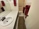 Cozy bathroom featuring a vanity, mirror, and accessible shower, providing convenience and comfort at 425 30Th W Ave # C112, Bradenton, FL 34205